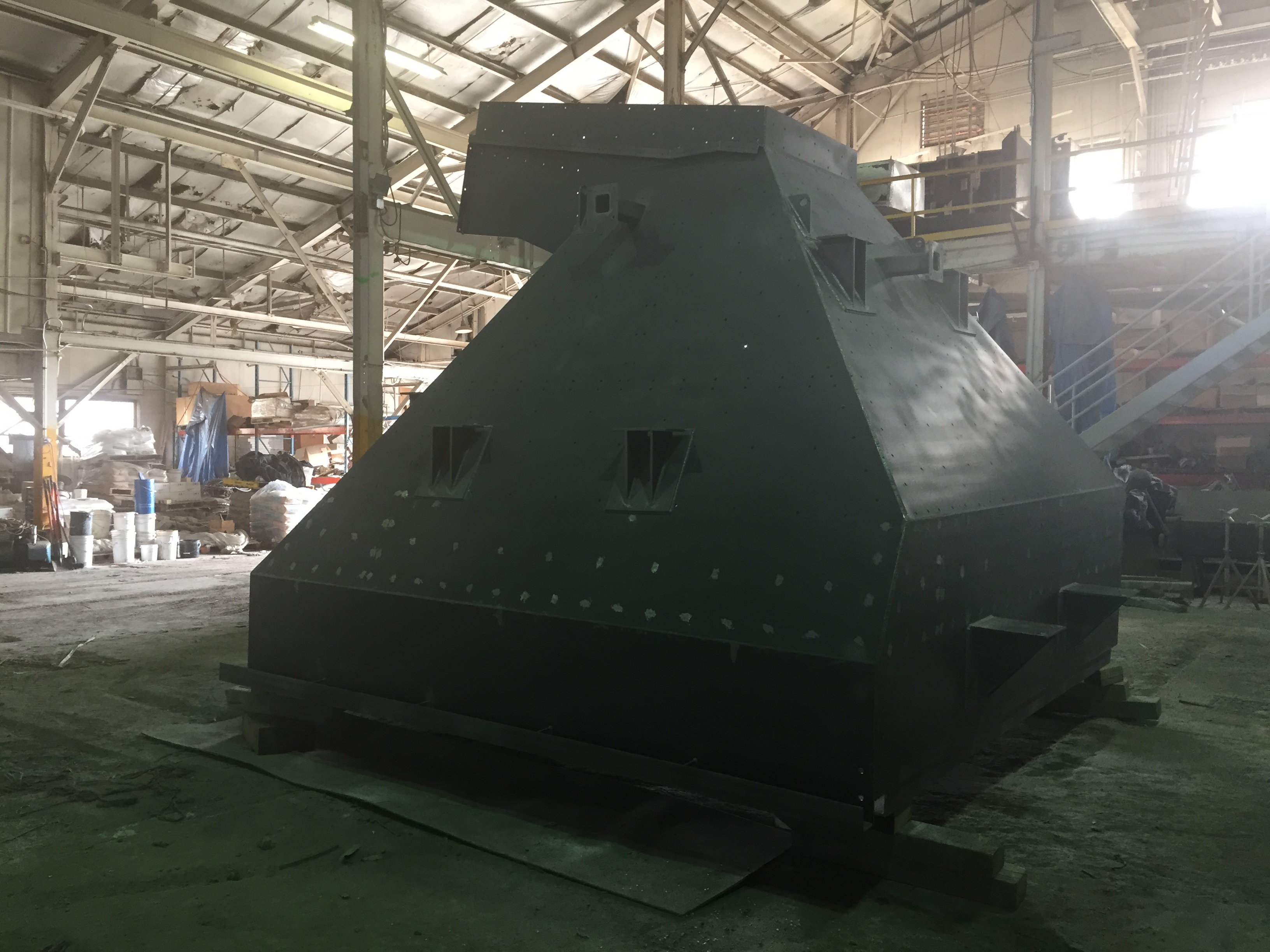 Hopper laying upside-down ready for transport